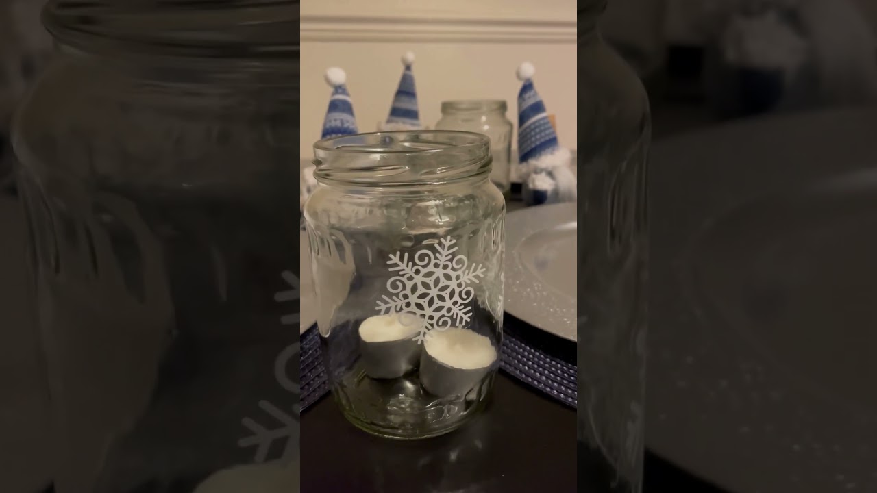 Simple Christmas candle idea. You need an empty jar, tea lights and festive window stickers 🎄❄️✨