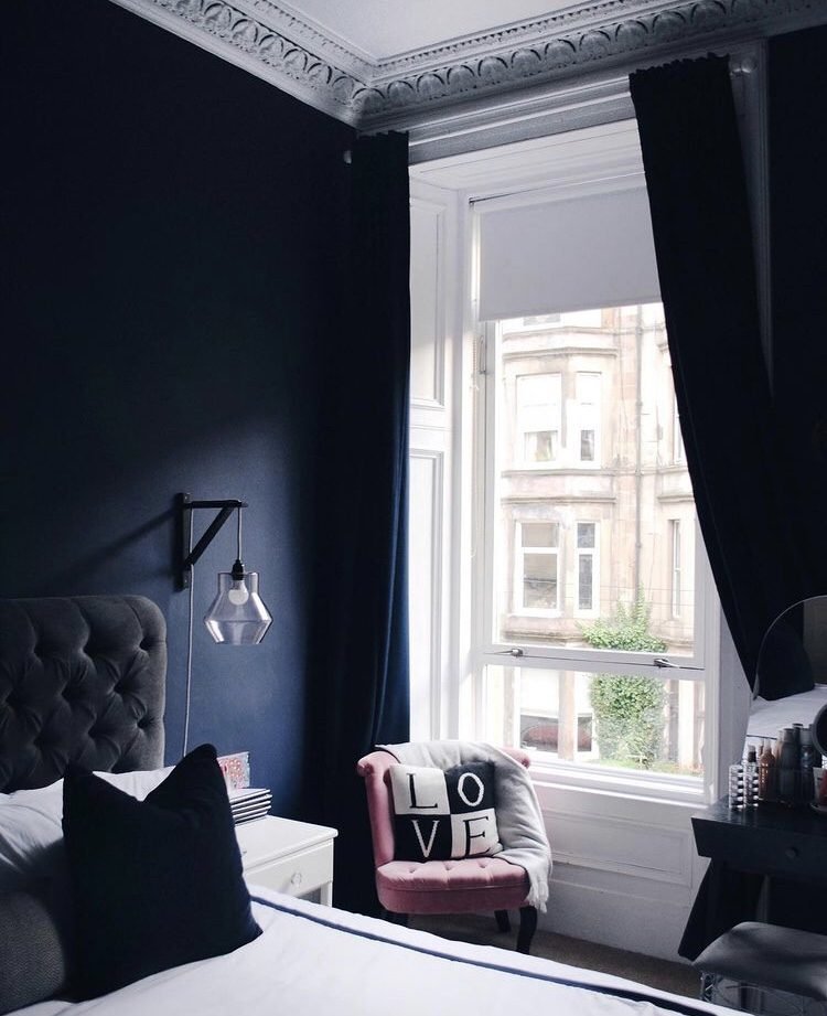 dark blue and white bedroom