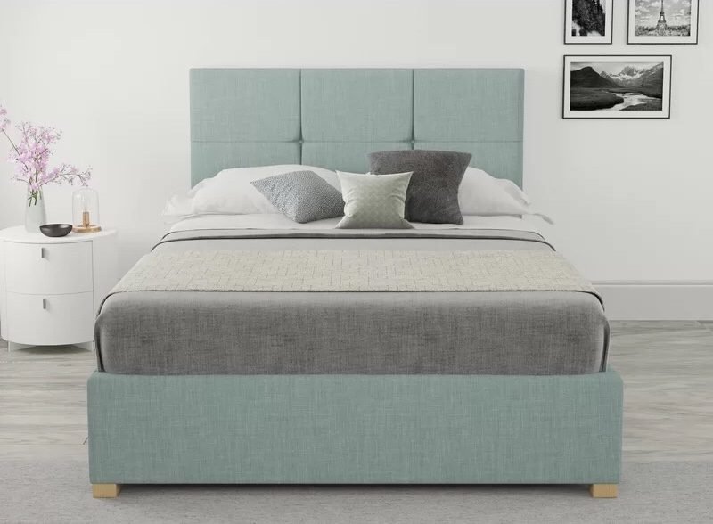 Mint colour bed for a modern bedroom design