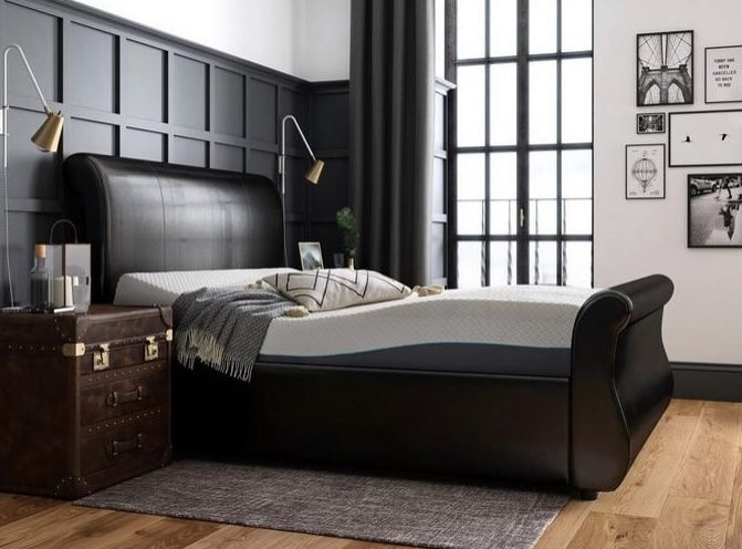 Black and white bedroom design with wall panel