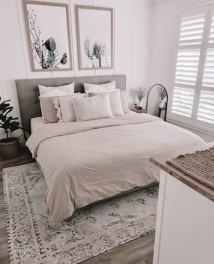 Image of a small bedroom decorated with neutral colours 