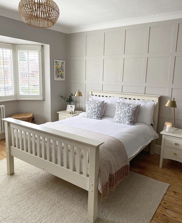 cream square wall panelling as an accent wall in bedroom