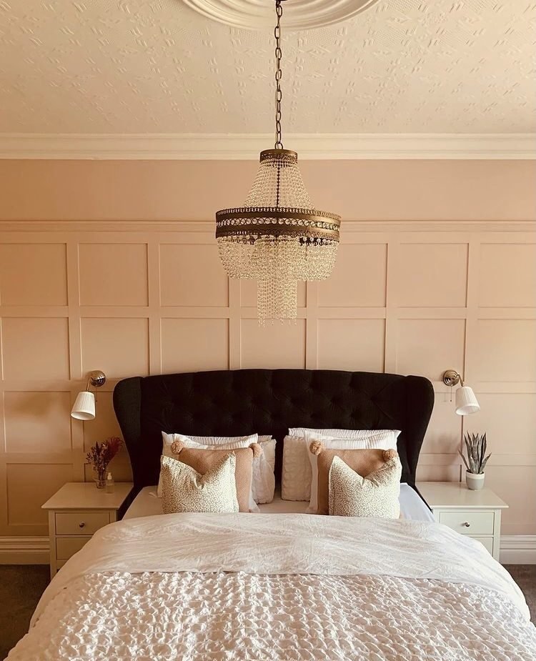 Image of a glamorously styled bedroom with periodic wall panelling