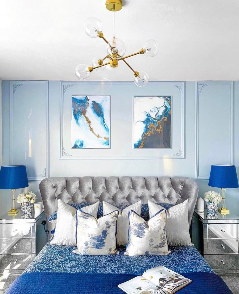 Vibrant blue bedroom idea with glam decor 