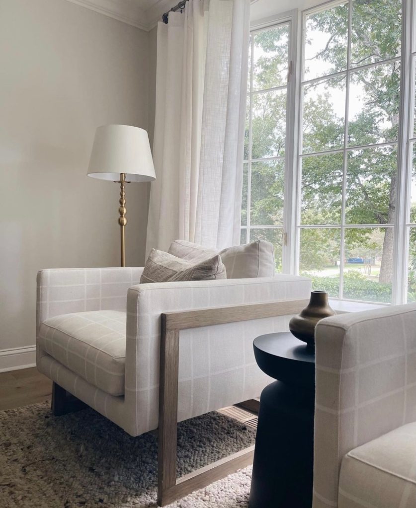 Living room nook with windows and curtains 