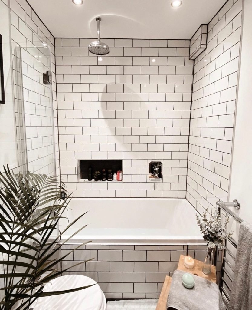 small bathroom with metro tiles and no windows 