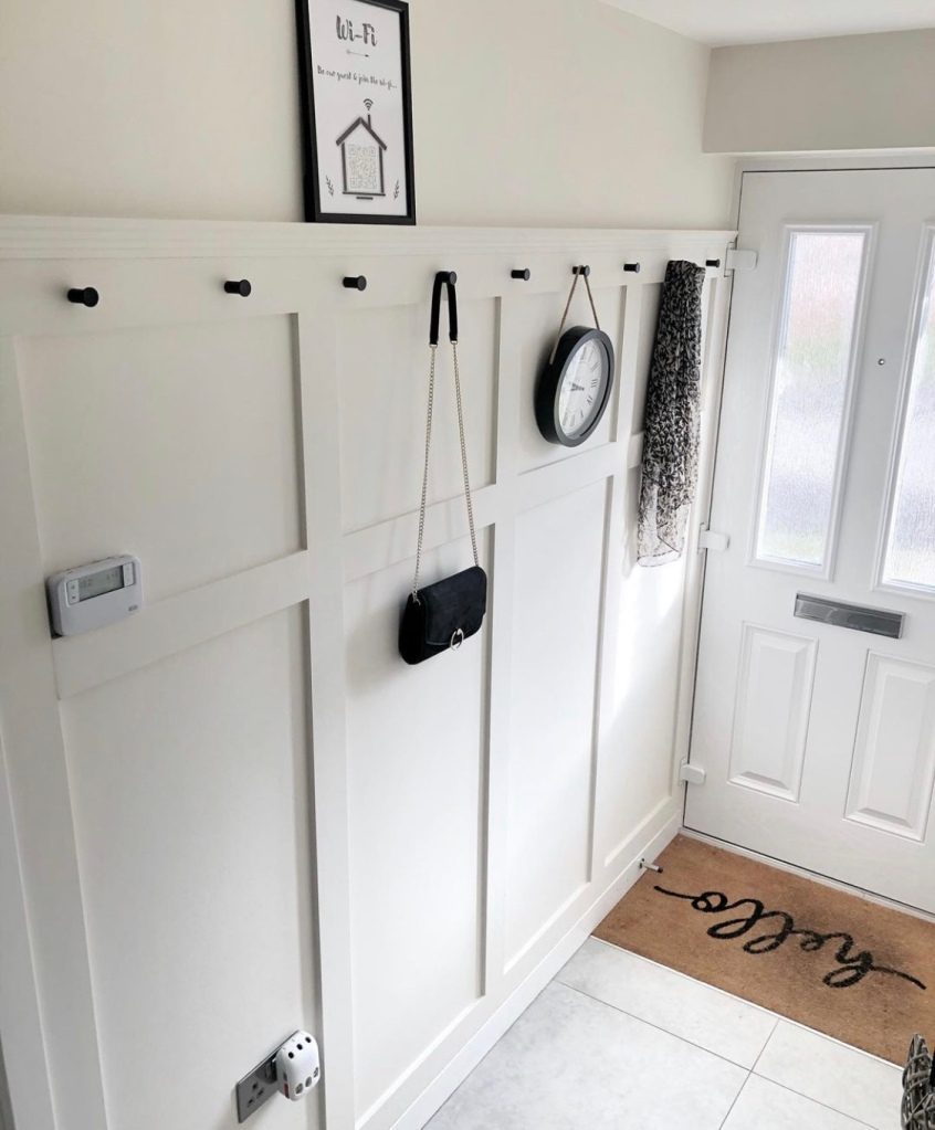 Double up your hallway panelling as a coat rack