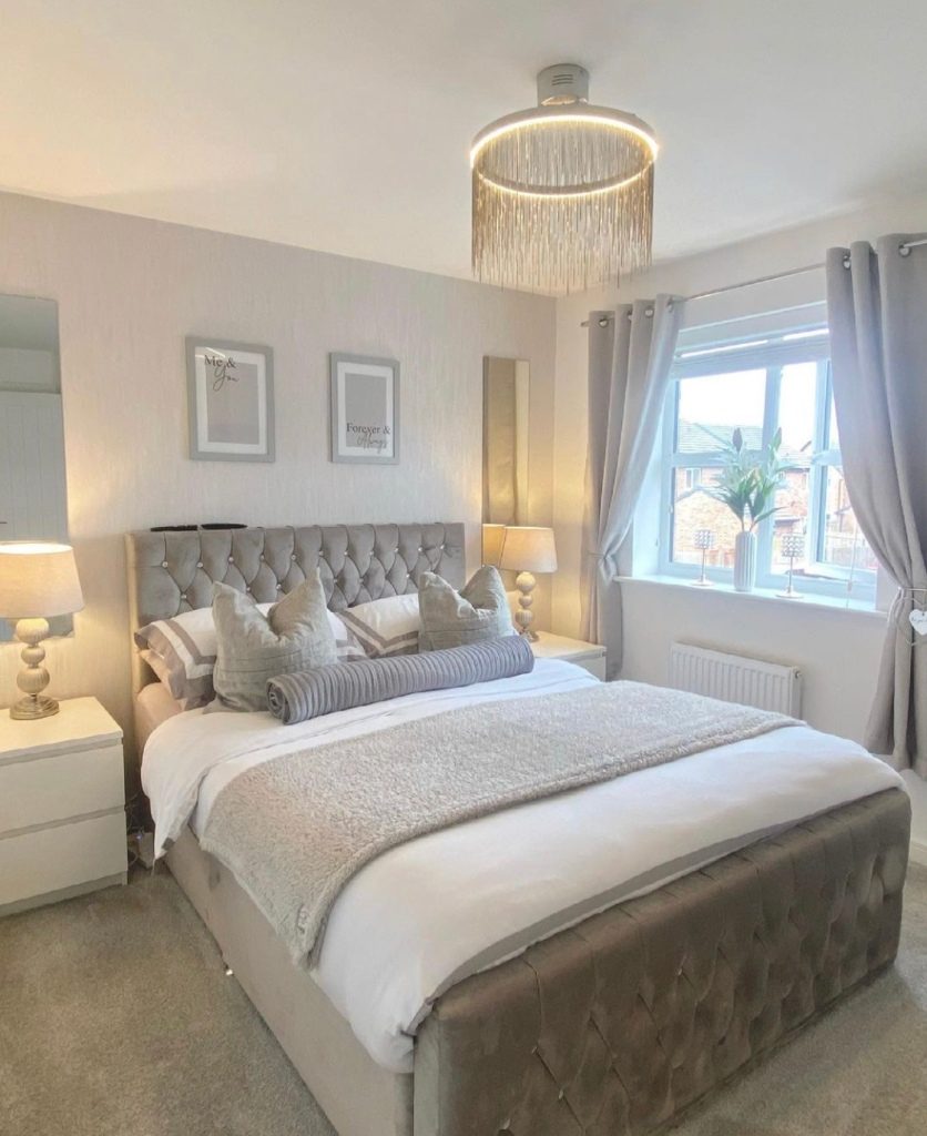 Grey bedroom with crushed velvet bed 