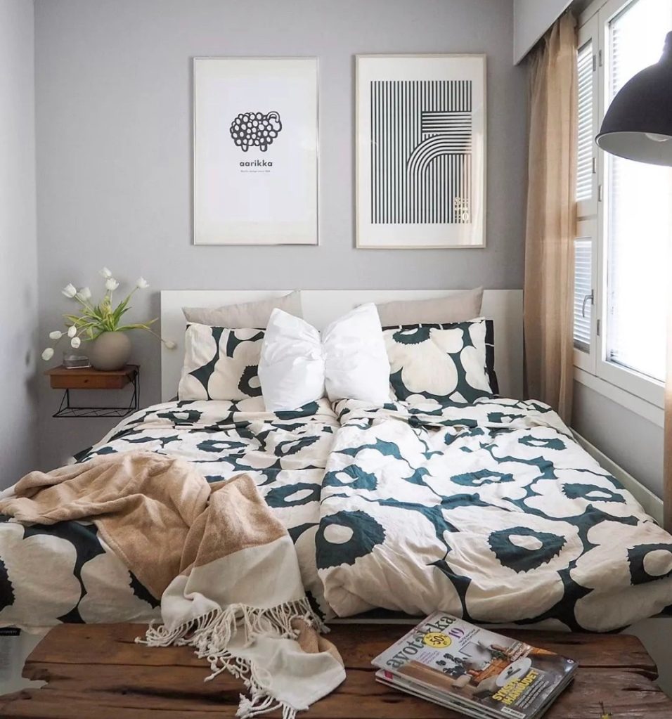 Grey bedroom with artwork