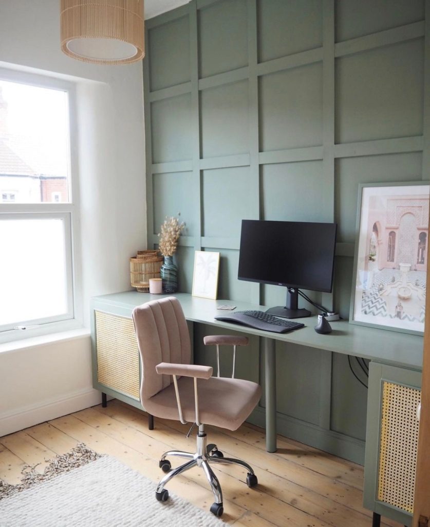 sage green and pink home office with wall panelling 