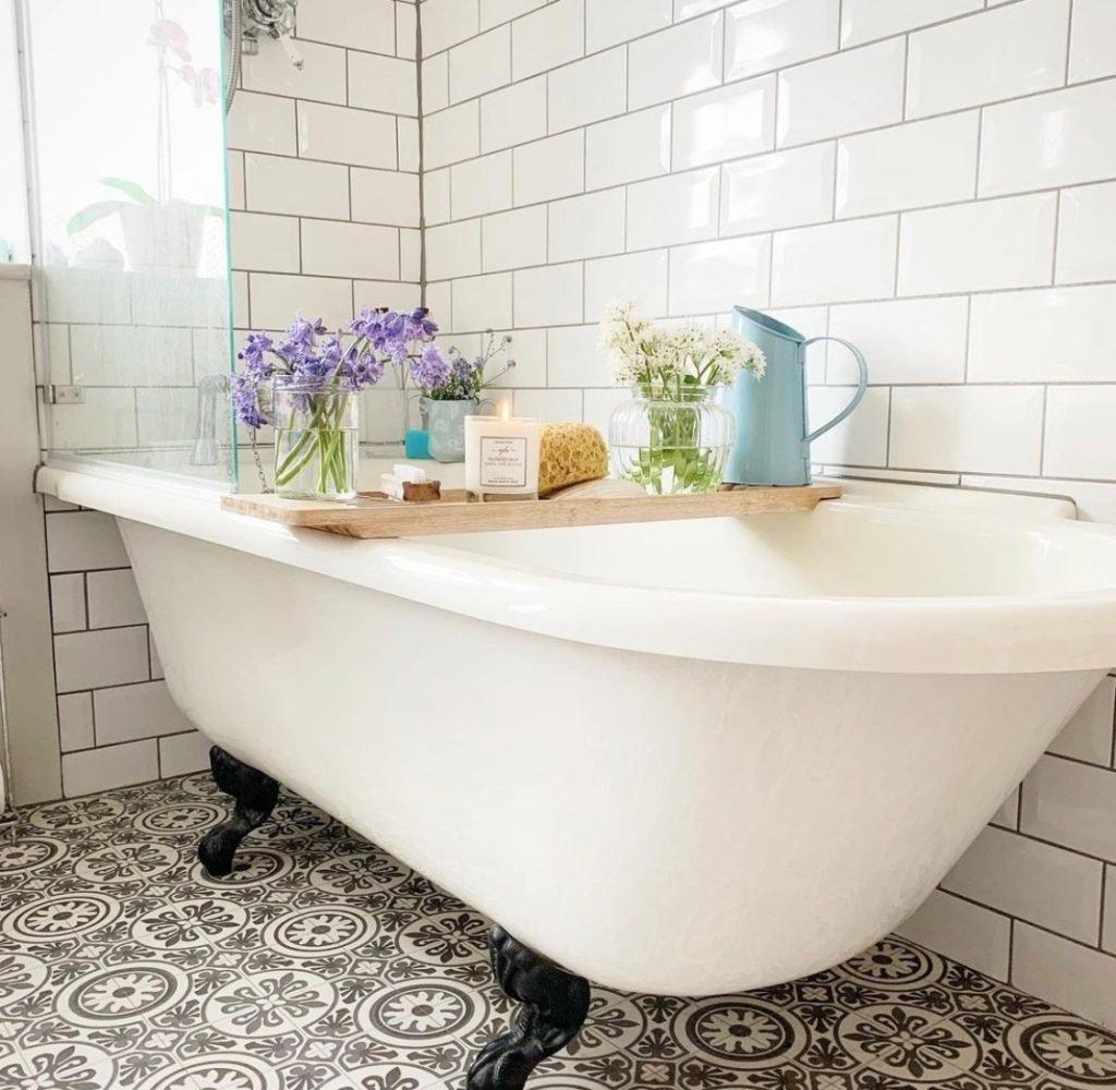 White bathroom with charcoal pattern floor tiles 