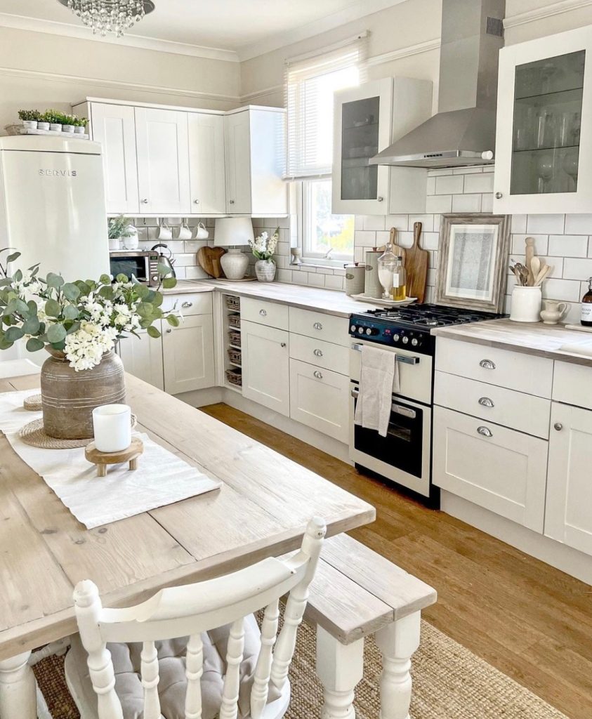 white country kitchen with dining table 