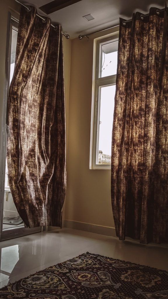 How to make your home luxurious on a budget - add longer curtains