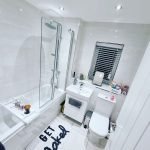 glossy-white-bathroom-bathroom-trends-for-2023