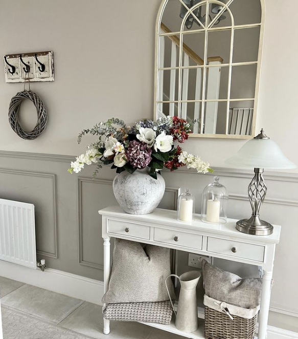 hallway console table ideas - white console table in a white hallway