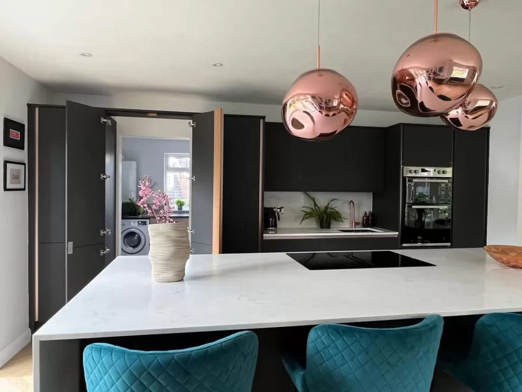 1970s home gets a kitchen transformation with a hidden door - kitchen with secret door to the utility room