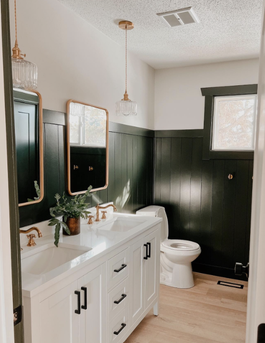 green panelling in a white bathroom for a country asethetic