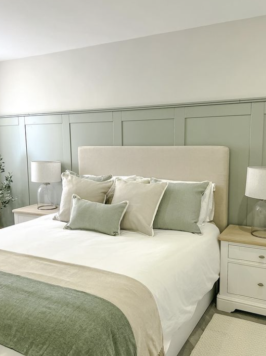 modern sage green panelling in the bedroom