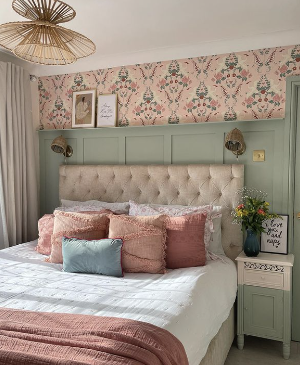 sage green panelling with pink in a bedroom