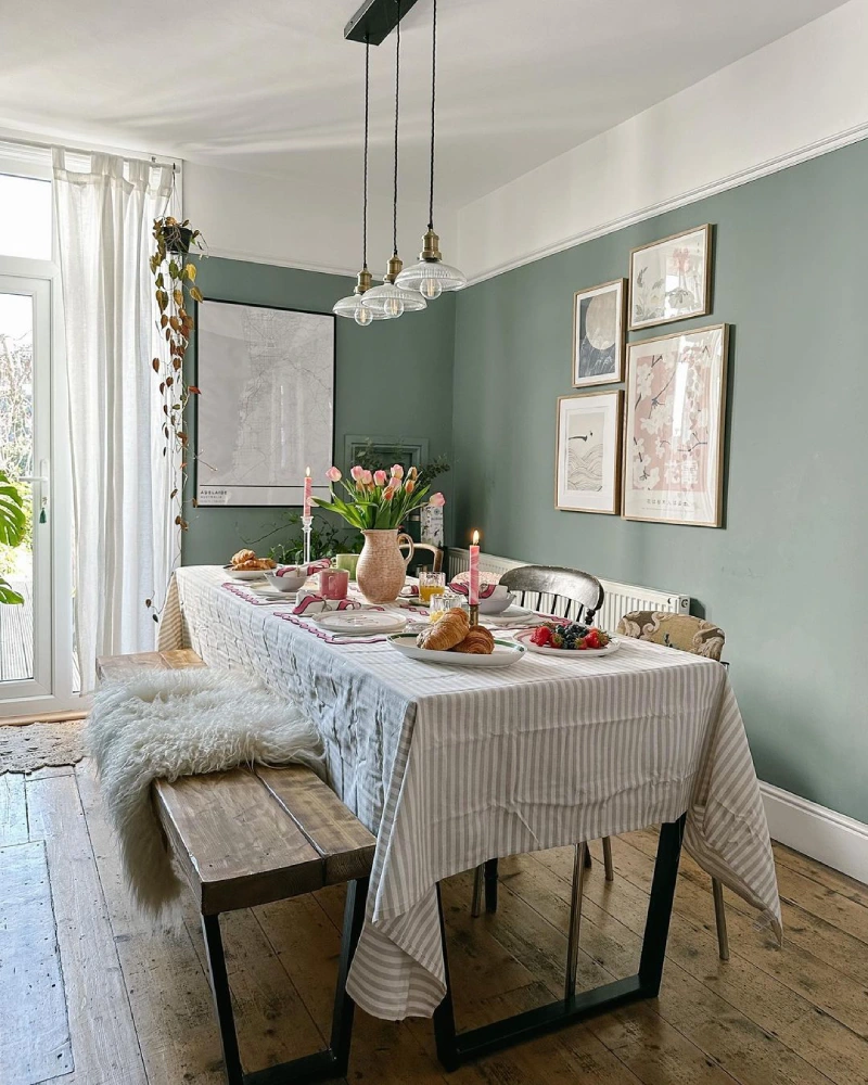 dining room decorating ideas - vintage dining room idea with gallery wall and blue walls