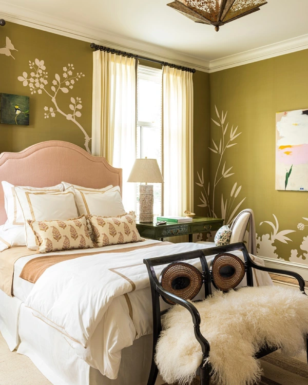 olive green bedroom with white and pink decor