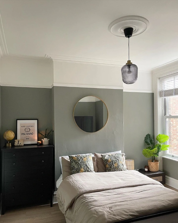 pigeon green bedroom with dark decor - colours that go with a green bedroom