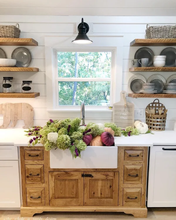 Rustic Farmhouse Kitchen With Open Shelving and Sink Cabinets