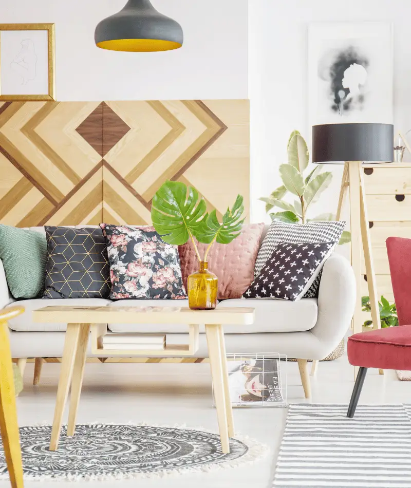 grey living room with fun patterns and colours