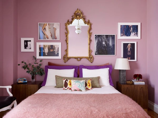 medium pink bedroom with gallery wall