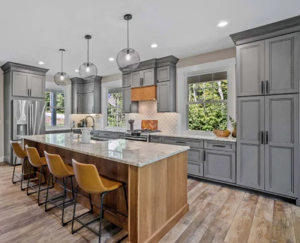 gray kitchen cabinets with brown