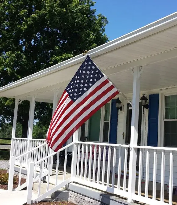 ways to perk up your front porch - add a flag