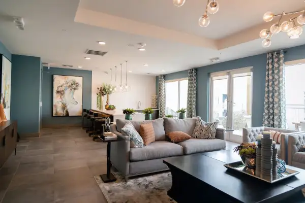 blue and grey living room open plan with dining room
