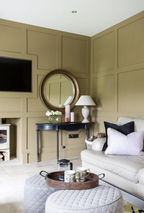 modern panelling iving room in green and neutral