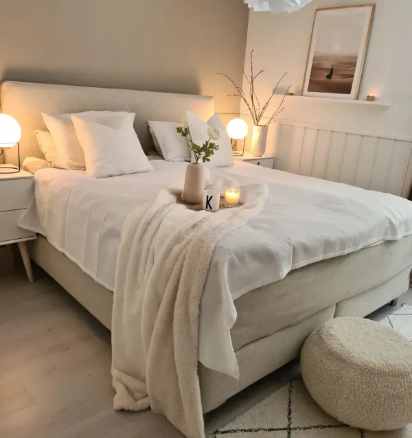 sphere bedside table lighting in a neutral bedroom