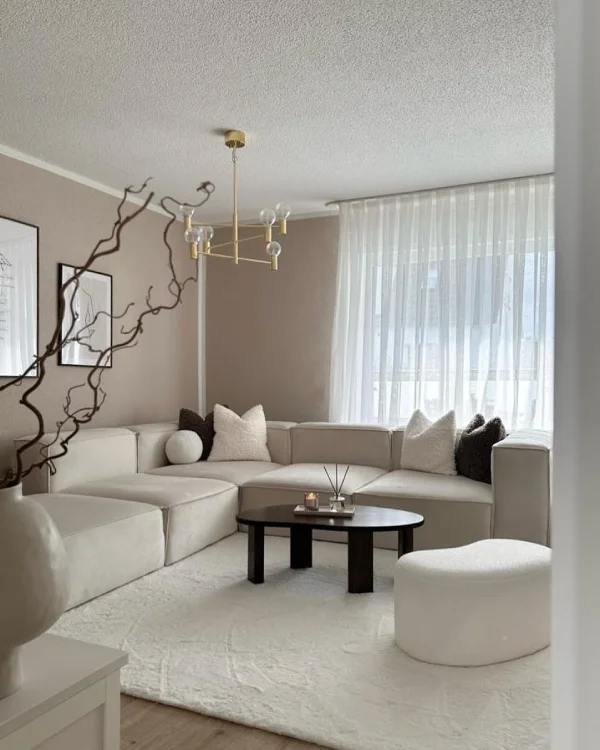 beige and cream neutral living room with curve decor