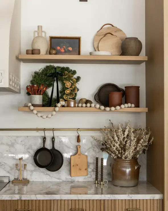 floating wooden shelves in a kitchen with neutral decor