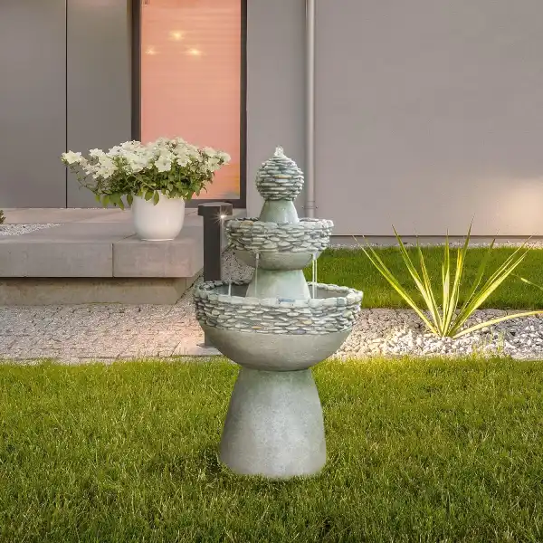 water fountain for your front yard to improve curb appeal