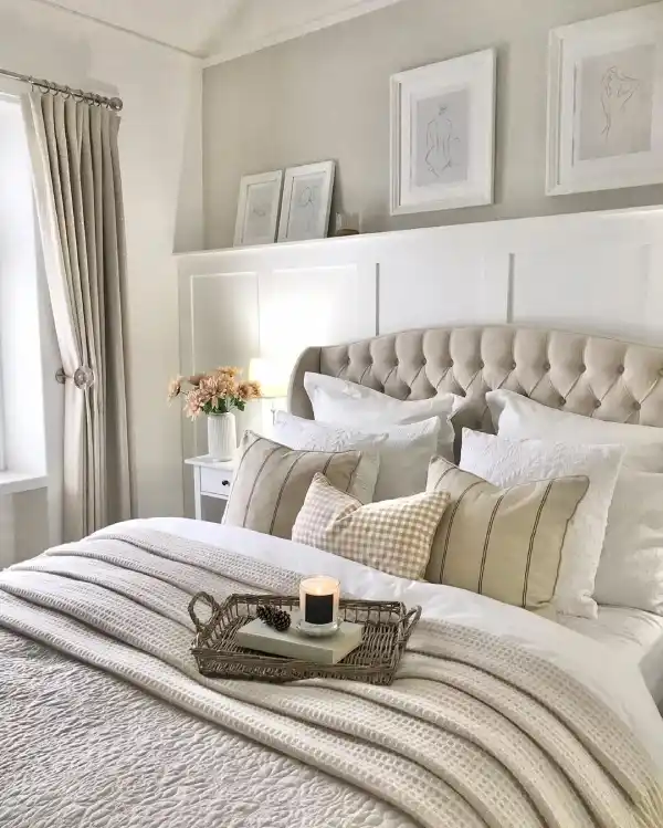 white and beige bedroom with panelling and shelving