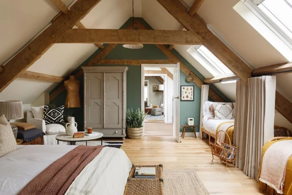 farrow and ball smoke green in a loft space with beams
