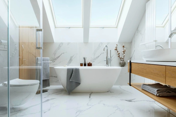 bathroom renovation tips - white marble bathroom