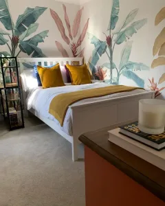 bedroom with tropical leaf florals