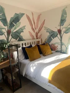 colourful leaf mural wallpaper in bedroom