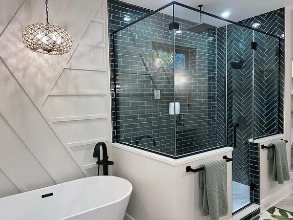 white and black bathroom design with walk in shower and bathtub 