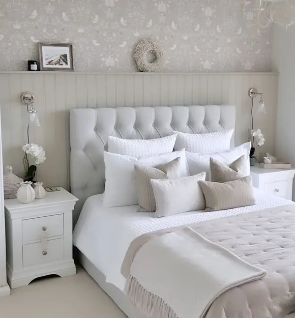 grey and white bedroom with half wall panelling and wallpaper