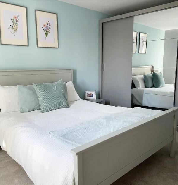 Duck egg blue bedroom with grey