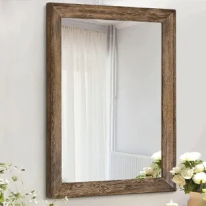 walnut frame mirror for a neutral bedroom