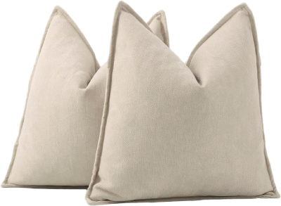 cream cushions for sofa in a green living room