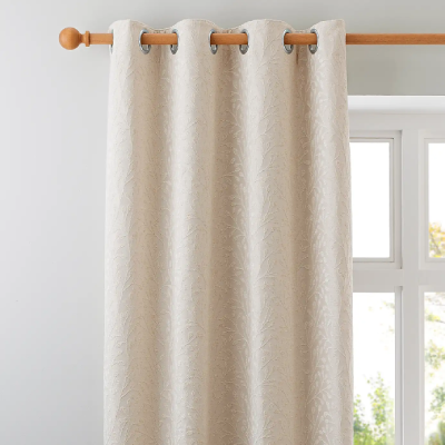 cream floral embossed curtains for a green living room